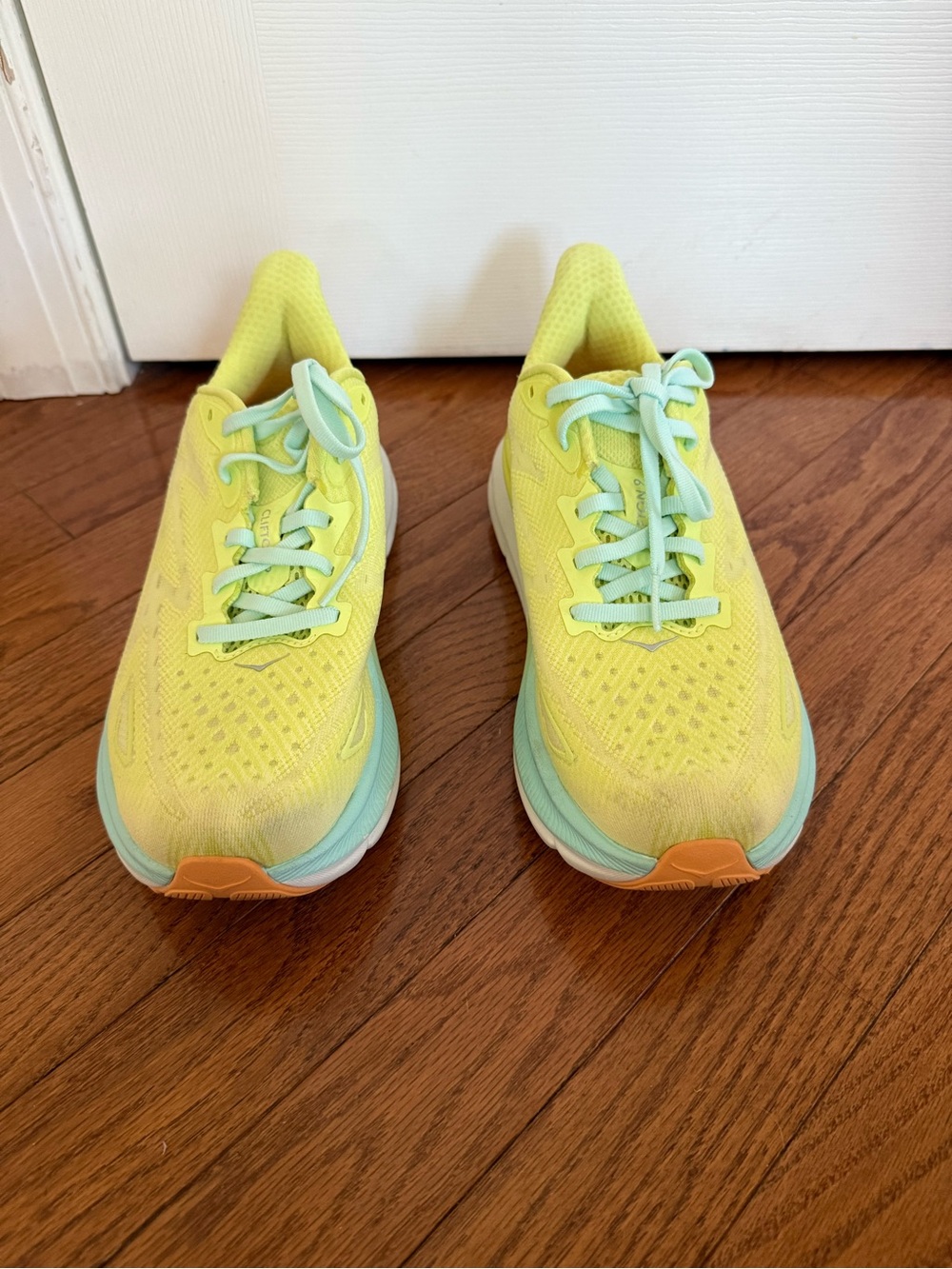 Hoka Women's Clifton 9 Yellow and Mint Running Shoes with Orange Accents